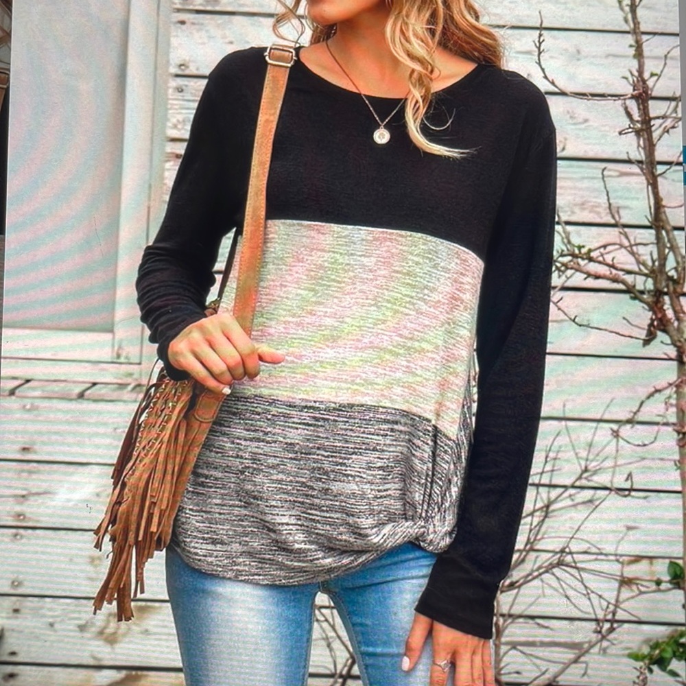 New never worn, sample product and looks great with leggings.  Color block